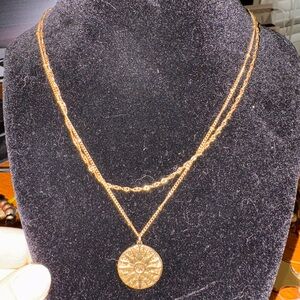 gold-tone Victoria Emerson sun medallion necklace by sugarplum
